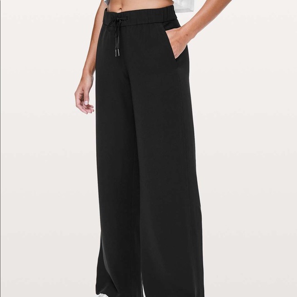 Lululemon black on the fly full length Pants - Picture 2 of 12